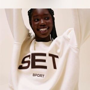 SET Active Cream Sweater with Brown Lettering